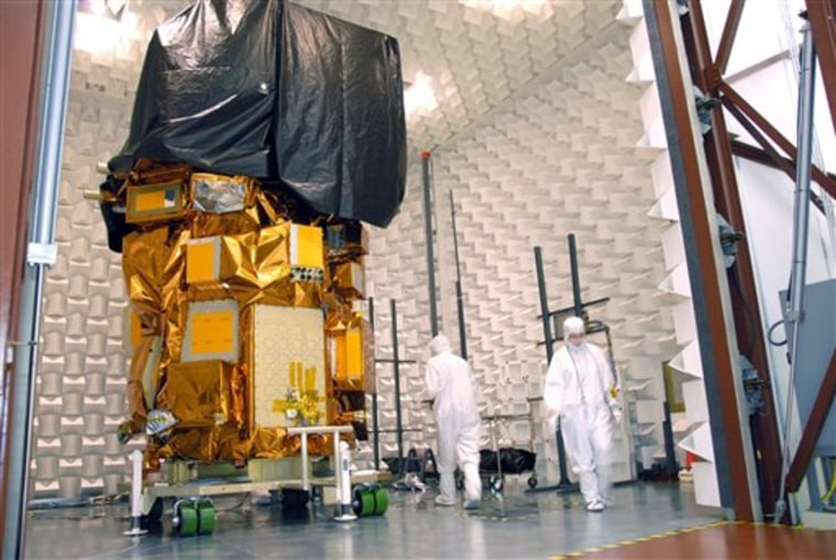 This NASA photo shows the next Landsat imaging satellite during testing at Orbital Science Corp.’s facility in Gilbert, Ariz in August. The imaging satellite will be known as Landsat 8 once it reaches orbit.